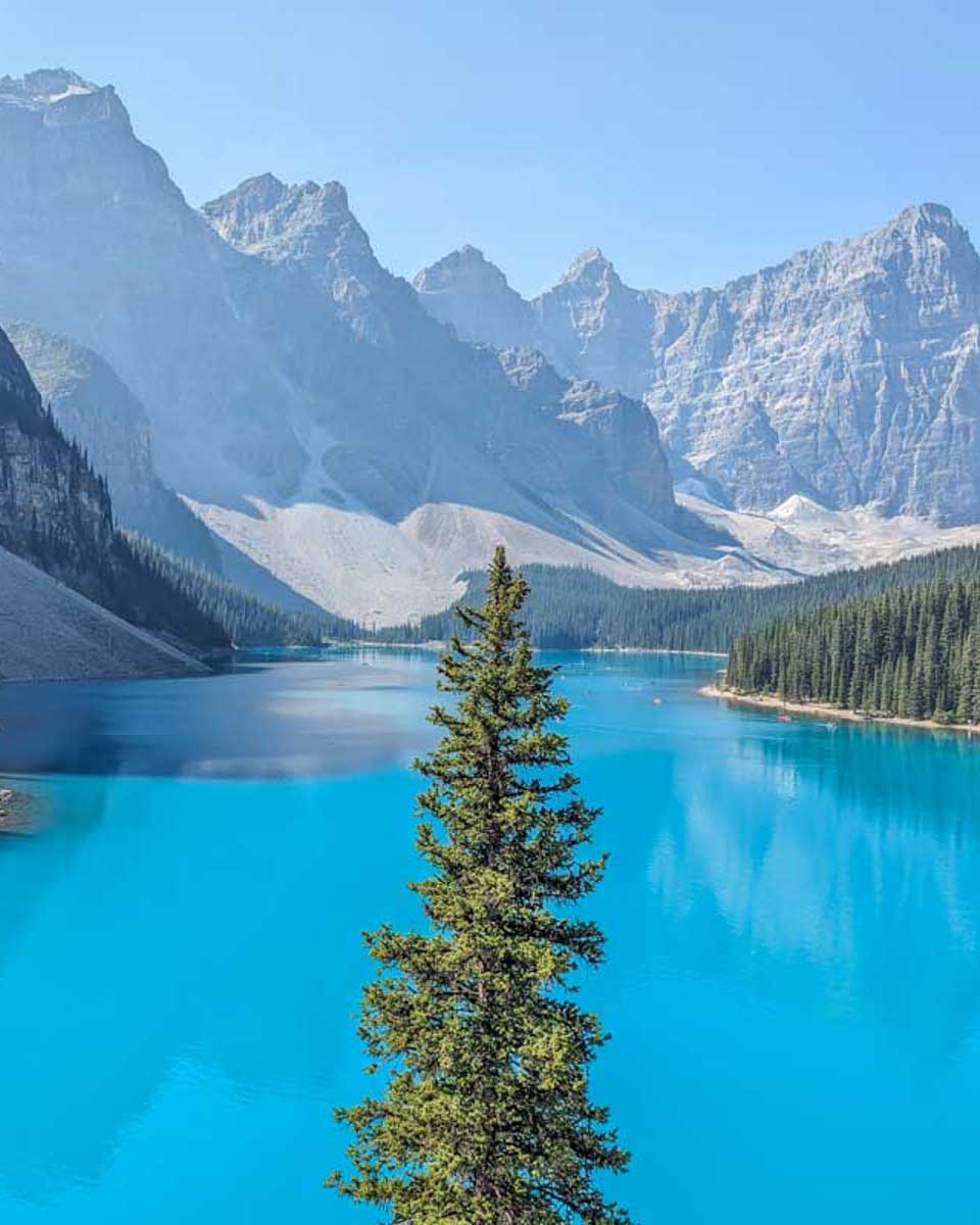 The-blue-water-of-Moraine-Lake-as-seen-from-the-rockpile-on-a-tour-of the icefields parkway