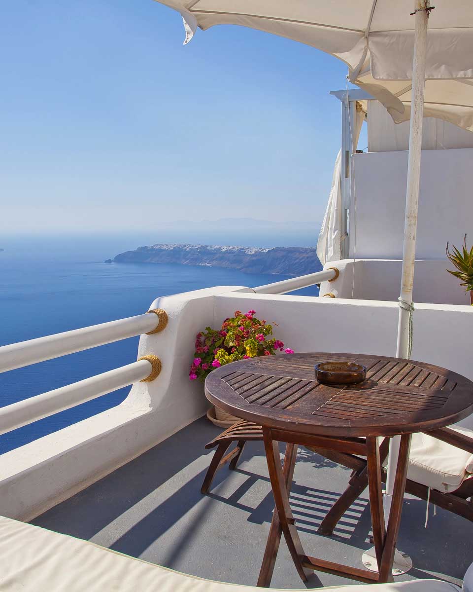 The view from Imerovigli on Santorini Greece at a cafe