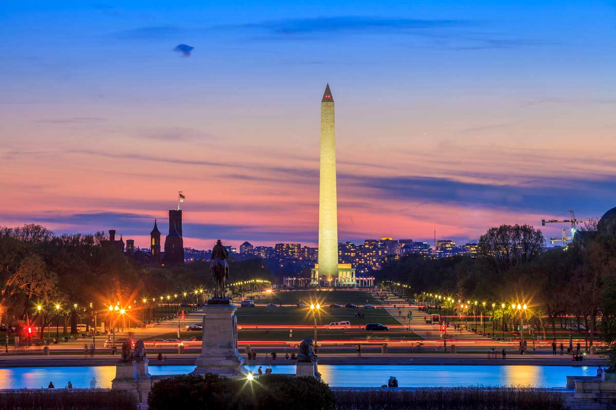 Washington DC city view at a orange sunset and Washington Memorial in the United States