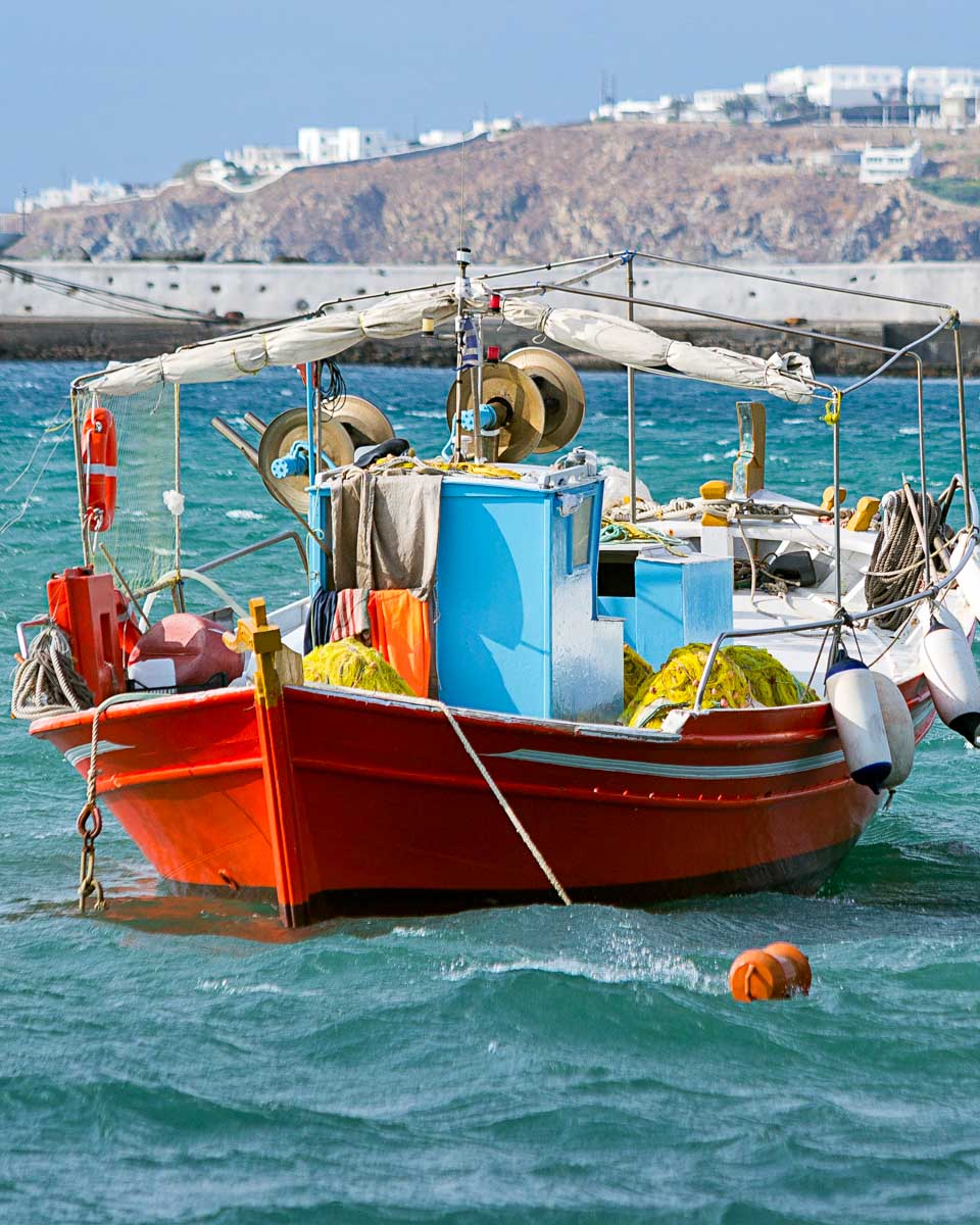 A fishing boat in Old Port Mykonos Greece