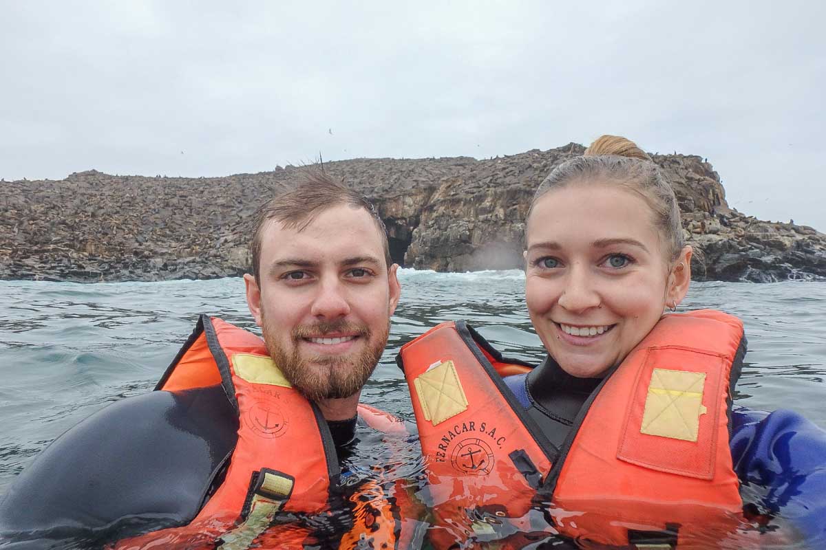 Bailey-and-Daniel-take-a-selfie-while-swimming-with-sea-lions-in-Lima Peru