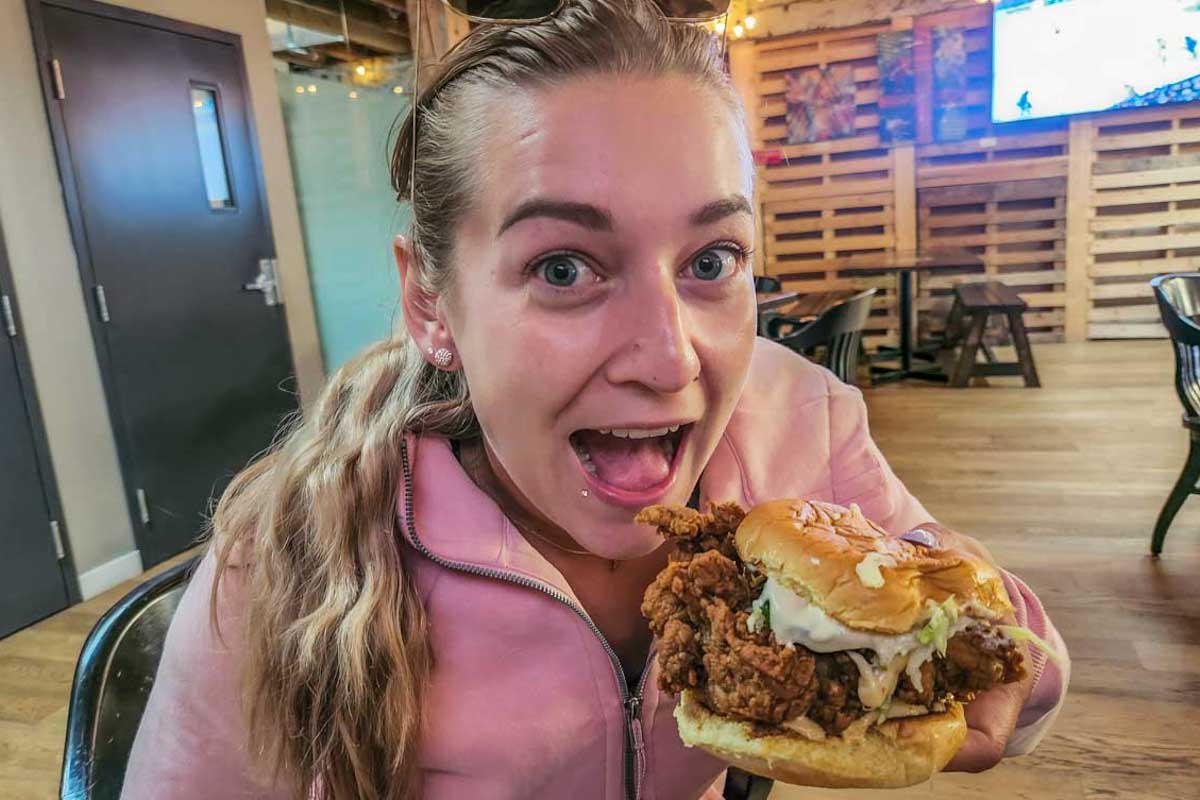 Bailey-eats-a burger in Charleston South Carolina