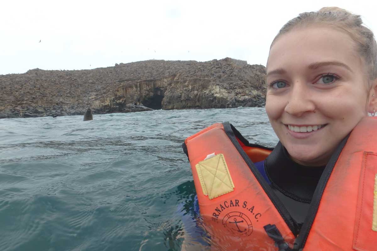 Bailey-takes-a-selfie-with-a-sea-lion-on-a-tour-from-Lima-Peru-1