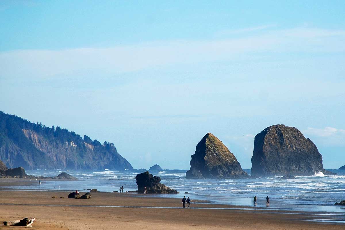 A wide shot of Cannon Beach seen on a tour from Portland Oregon