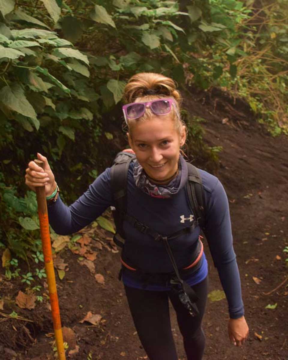 Bailey hikes on an overnight trip to Acatenango Volcano from Antigua Guatemala