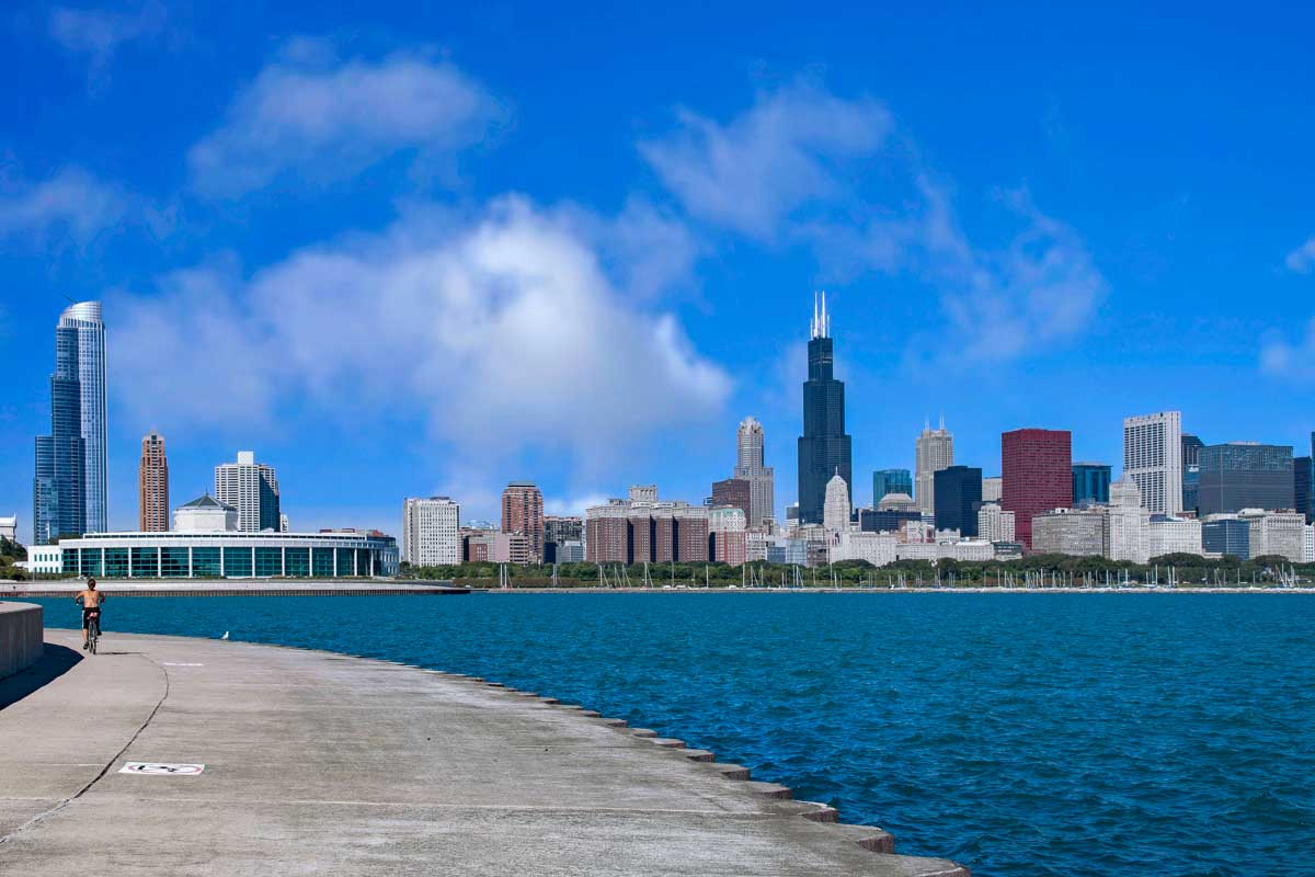 Chicago lakefront bicycle trail with view of downtown skyline in Chicago Illinois