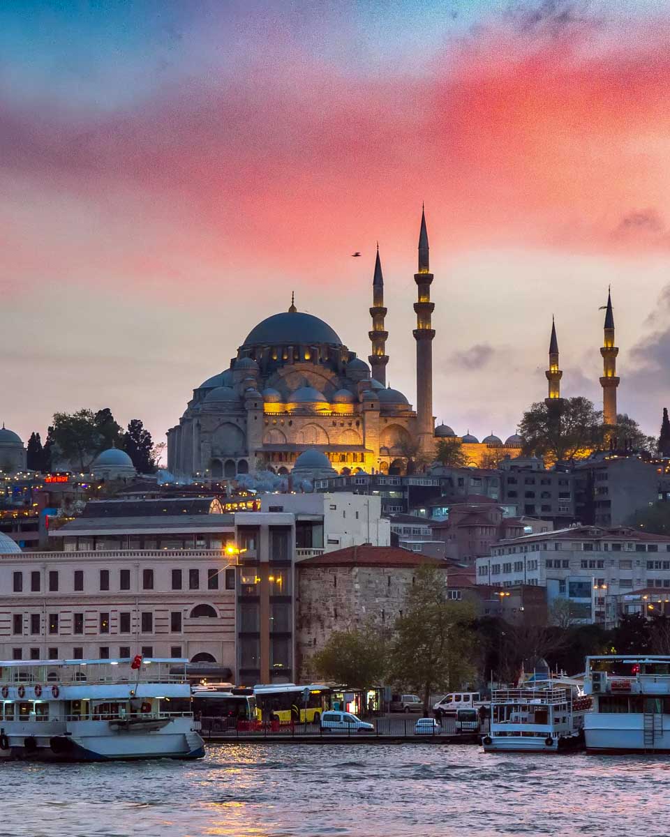 Süleymaniye Mosque in Istanbul, Turkey seen at sunset on a cruise