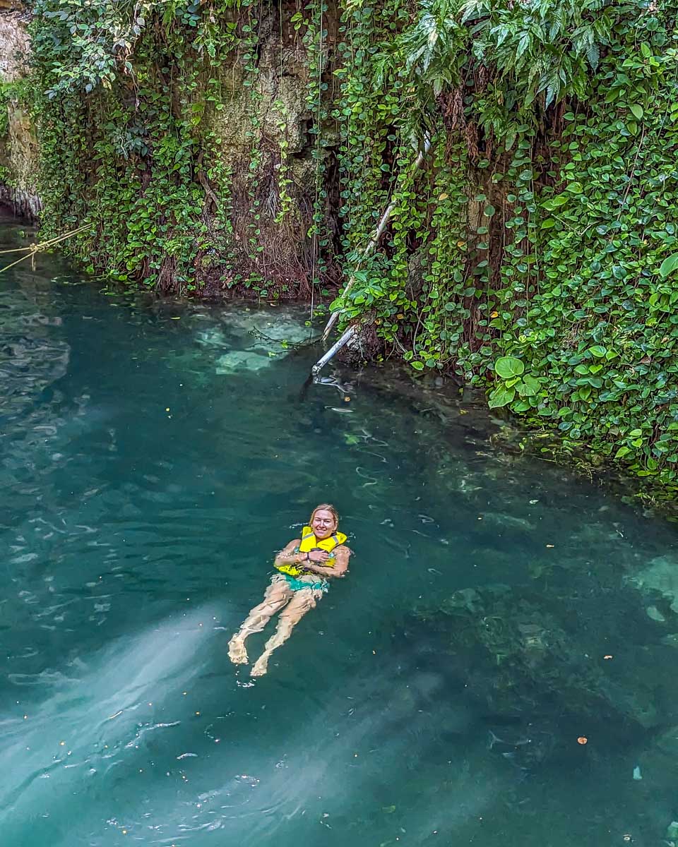 Bailey-swims-in-a-Cenote-in-Mexico-on-a-tour-to-Chichen-Itza-from Playa del Carmen Mexico