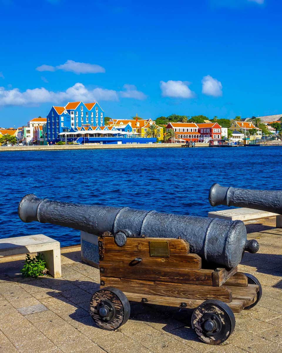 Canons and colored buildings in Curacao