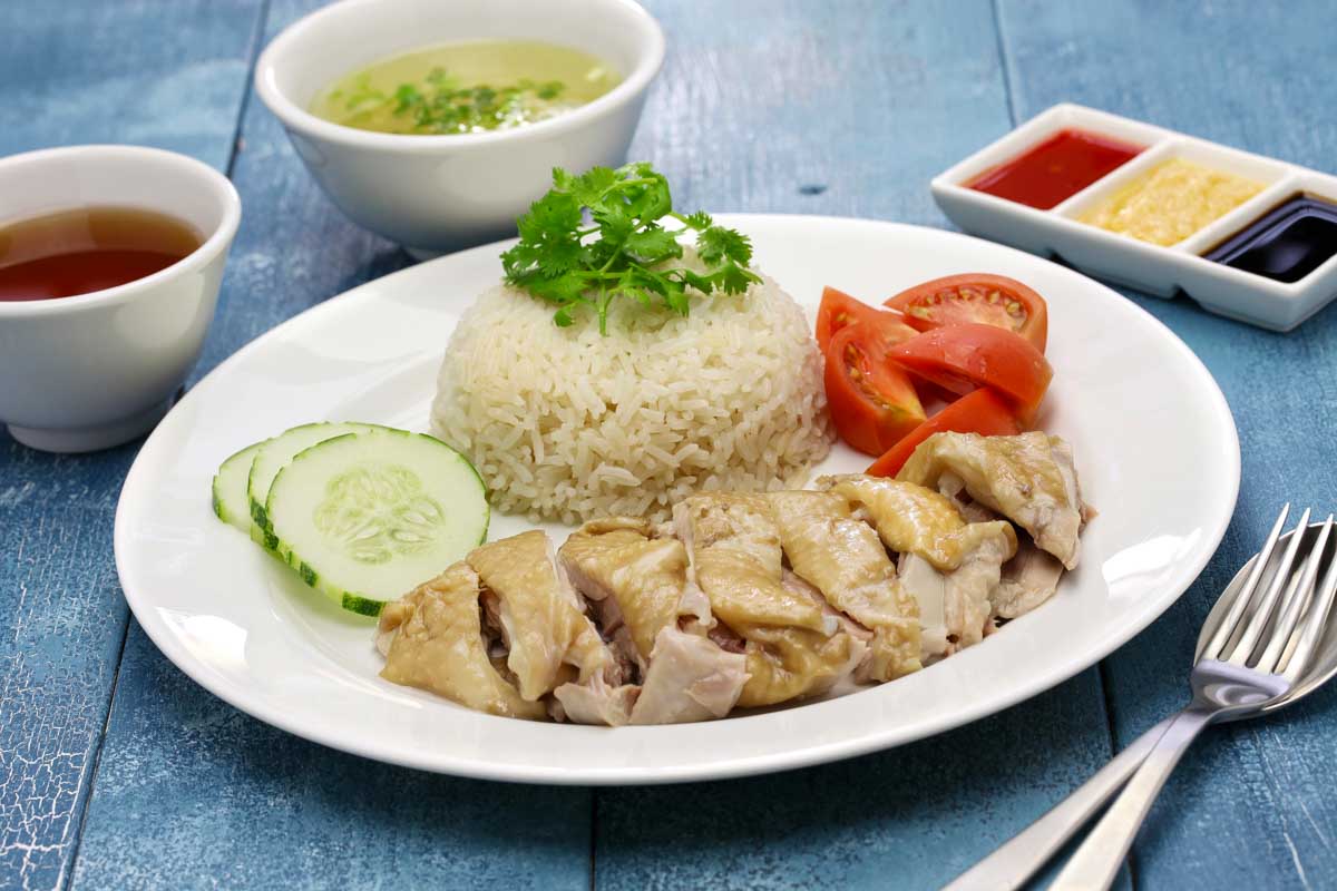 Hainanese chicken rice eaten in Singapore