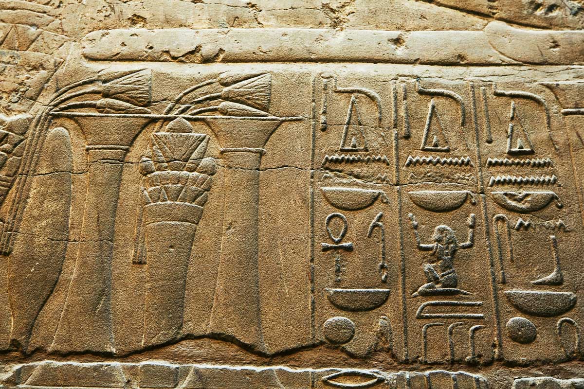 Looking at hieroglyphics in the museum on a tour of Cairo Egypt