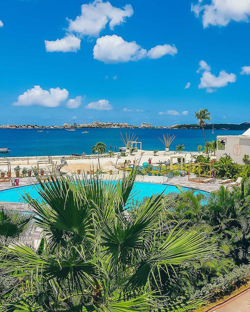 Aerial view of the pool and beach area at Hommage Hotel & Residences St-Martin