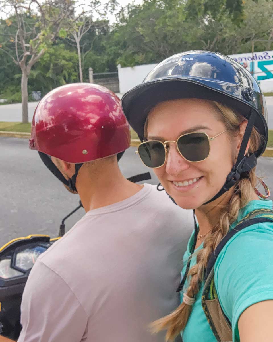 Bailey-takes-a-selfie-while-she-rides-on-the-back-of-a-rental-scooter-with-Daniel-in Bohol Philippines