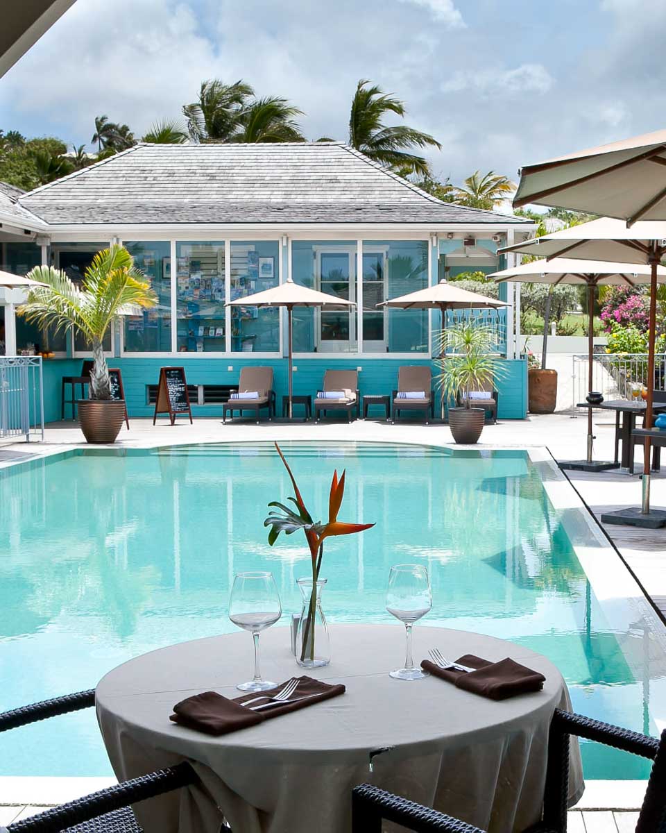Pool and dining area at Hotel La Plantation Saint Martin