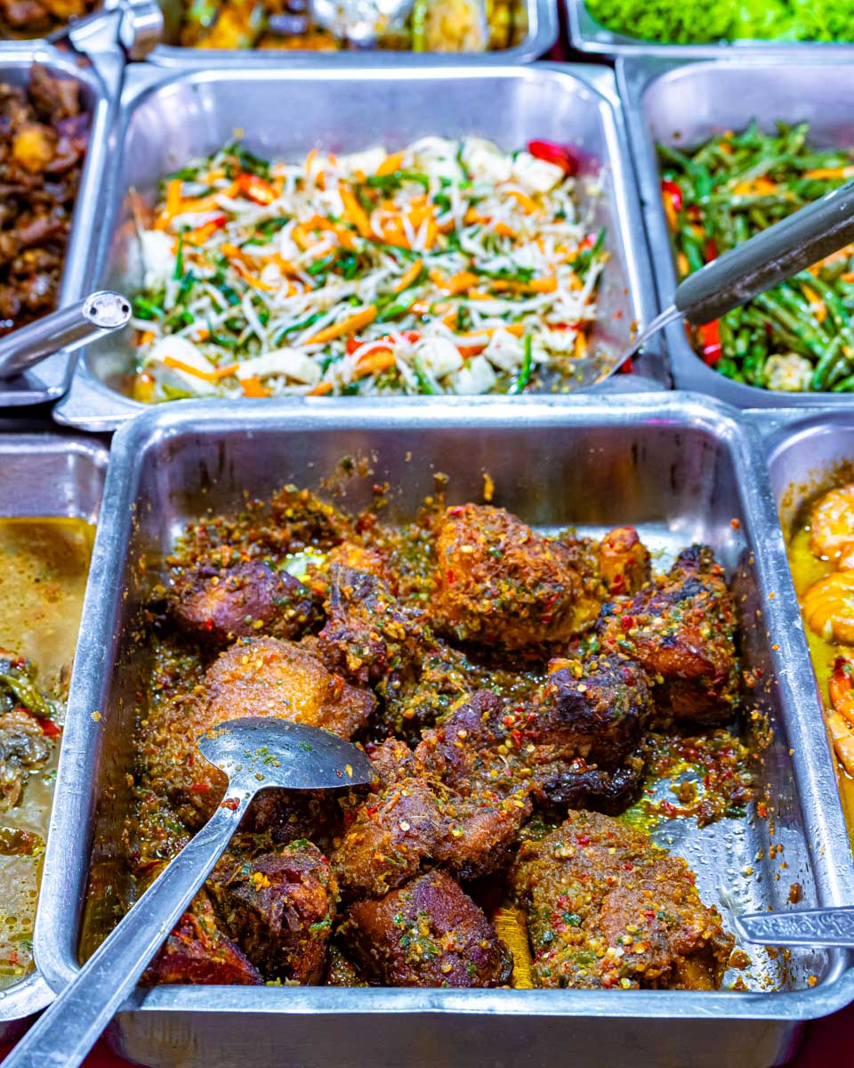 Some street food sold at Jalan Alor market in Bukit Bintang district in Kuala Lumpur Malaysia