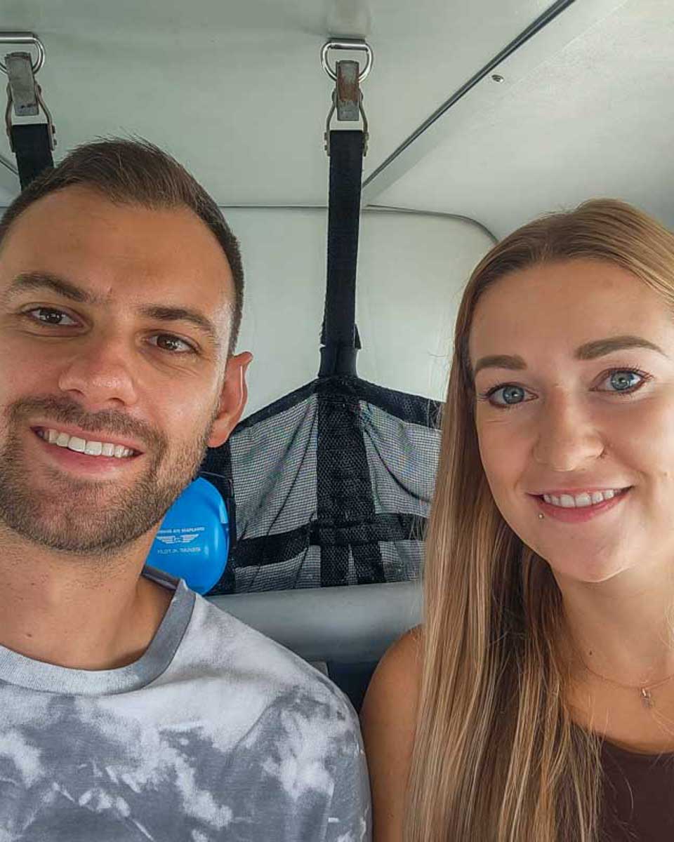 Bailey-and-Daniel-take-a-selfie-on-a-plane-tour from Airlie Australia