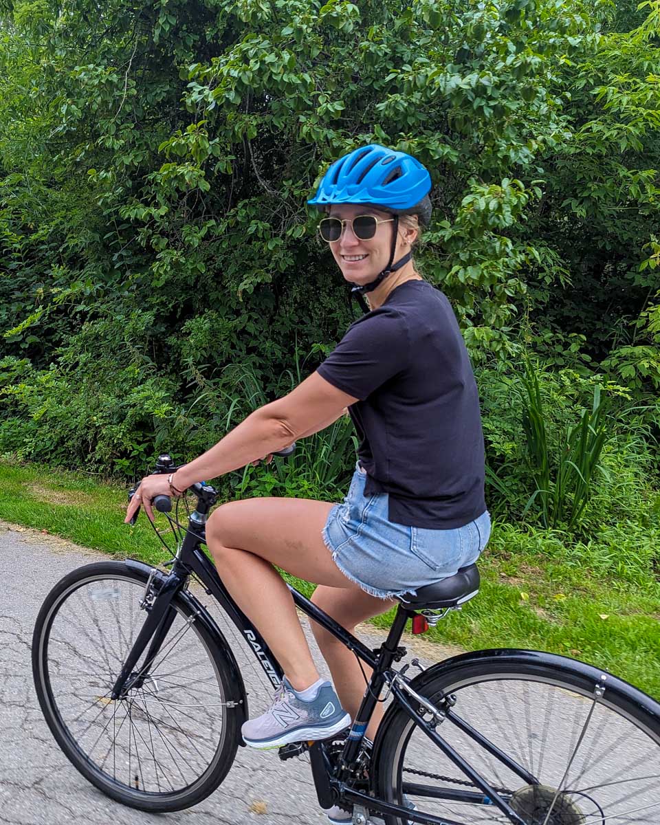Bailey rides a bike on a wine tour from Adelaide