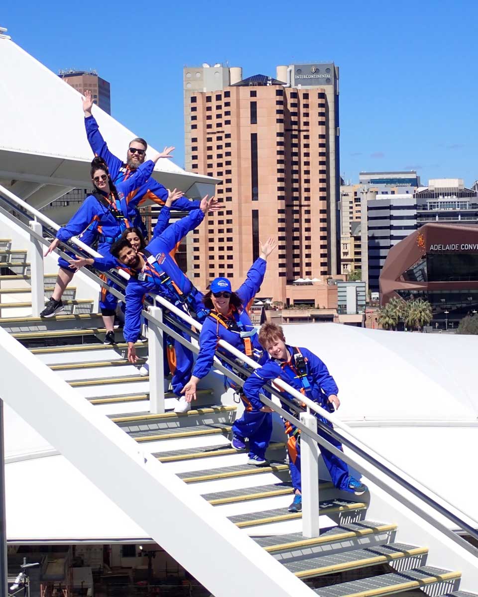 People climbing up to the top of the oval with RoofClimb Adelaide Oval