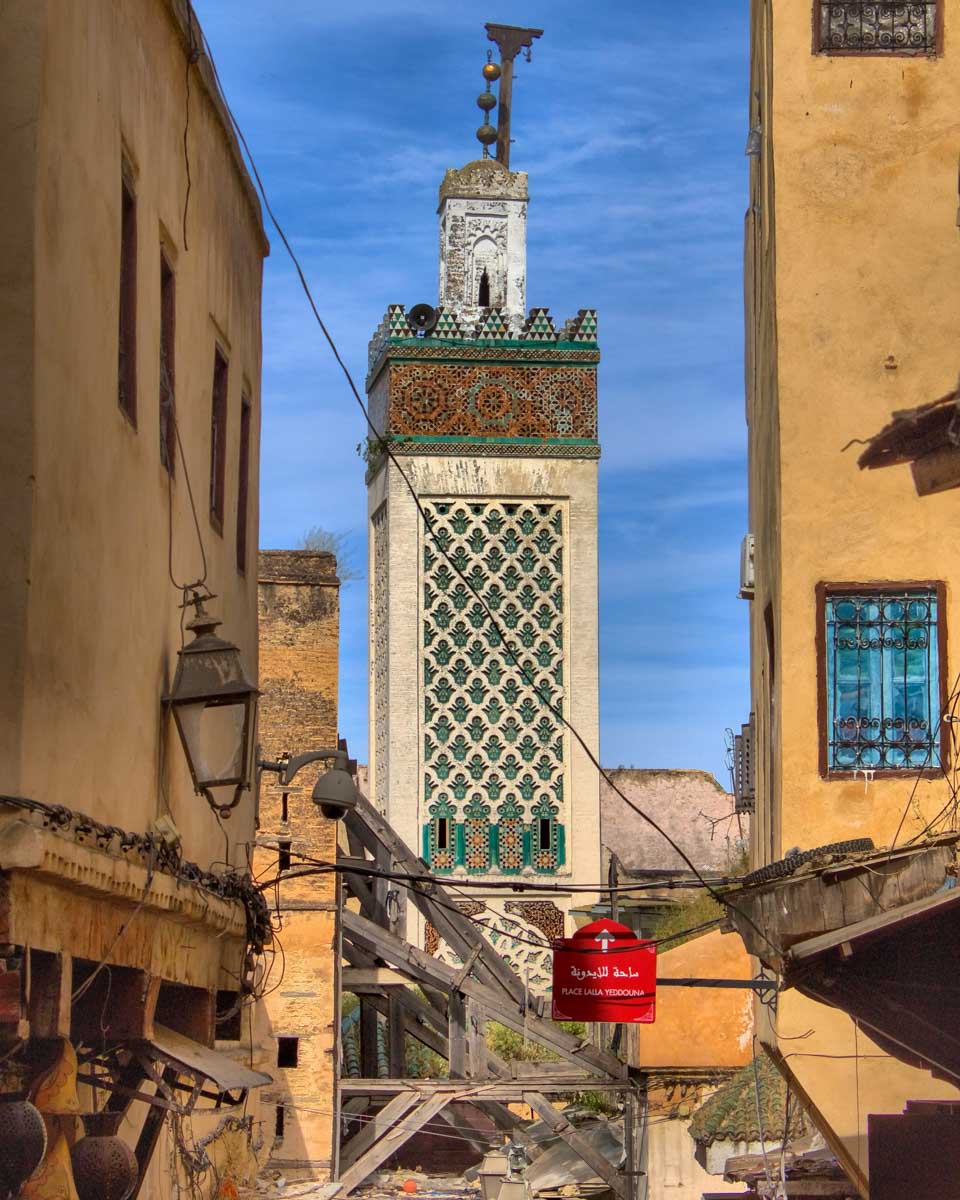 Small-street-and-Al-Andalus-Mosque-in-Fez-medina-old-town-Morocco-1