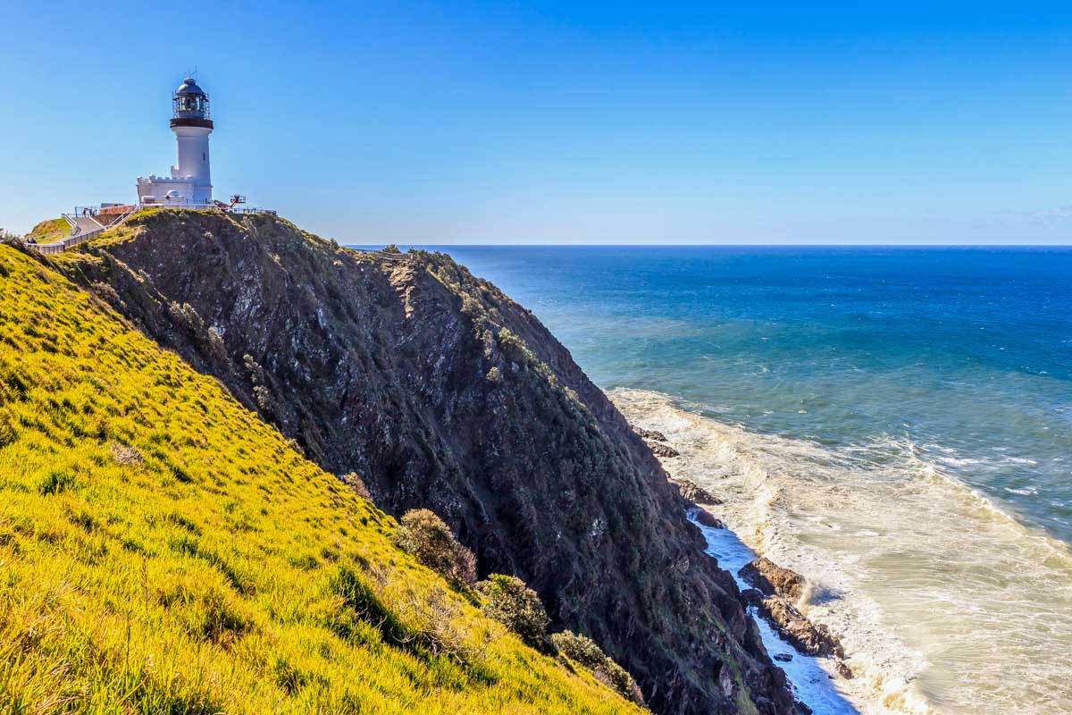 Cape Byron lighthouse on cliff on a sunny day near Byron Bay Australia