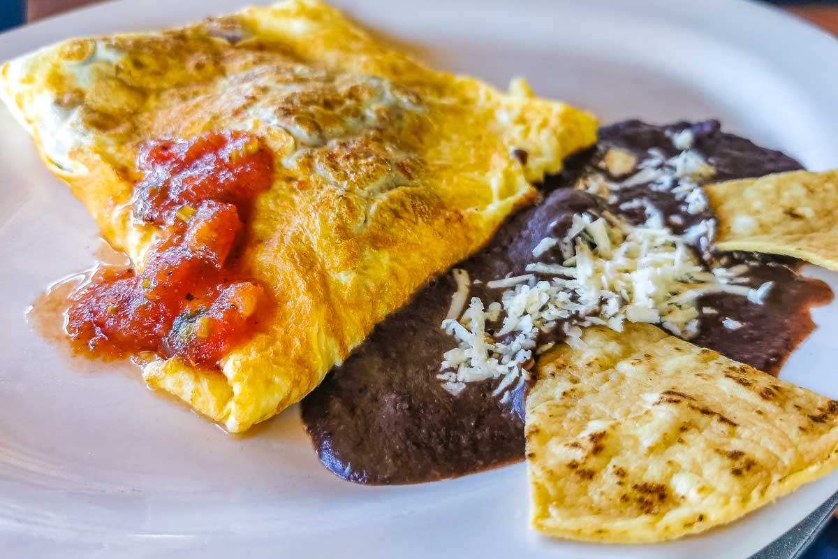 Breakfast of eggs and tortilla eaten in Mazatlan Mexico