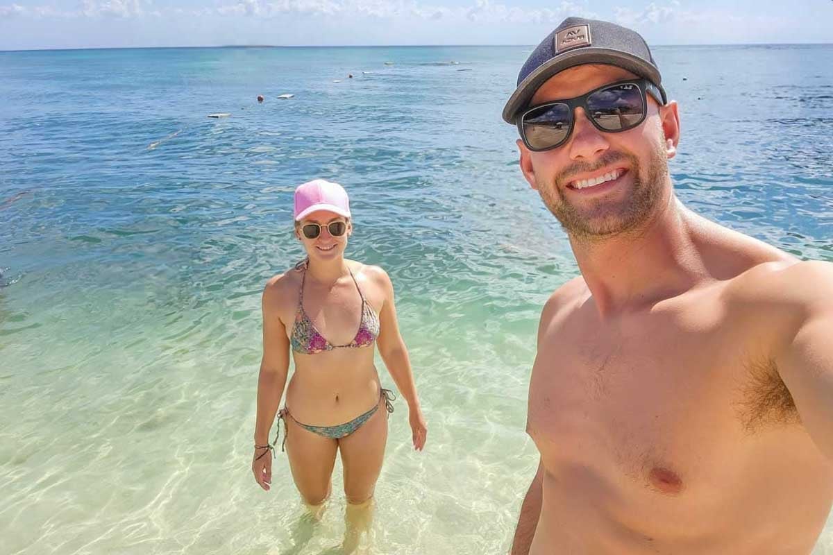 Daniel-and-Bailey-take-a-selfie-on-the-beach-in Sunshine Coast Australia