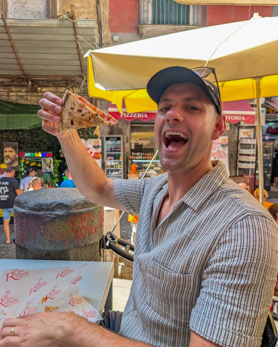Daniel-eating-pizza-in Genoa Italy