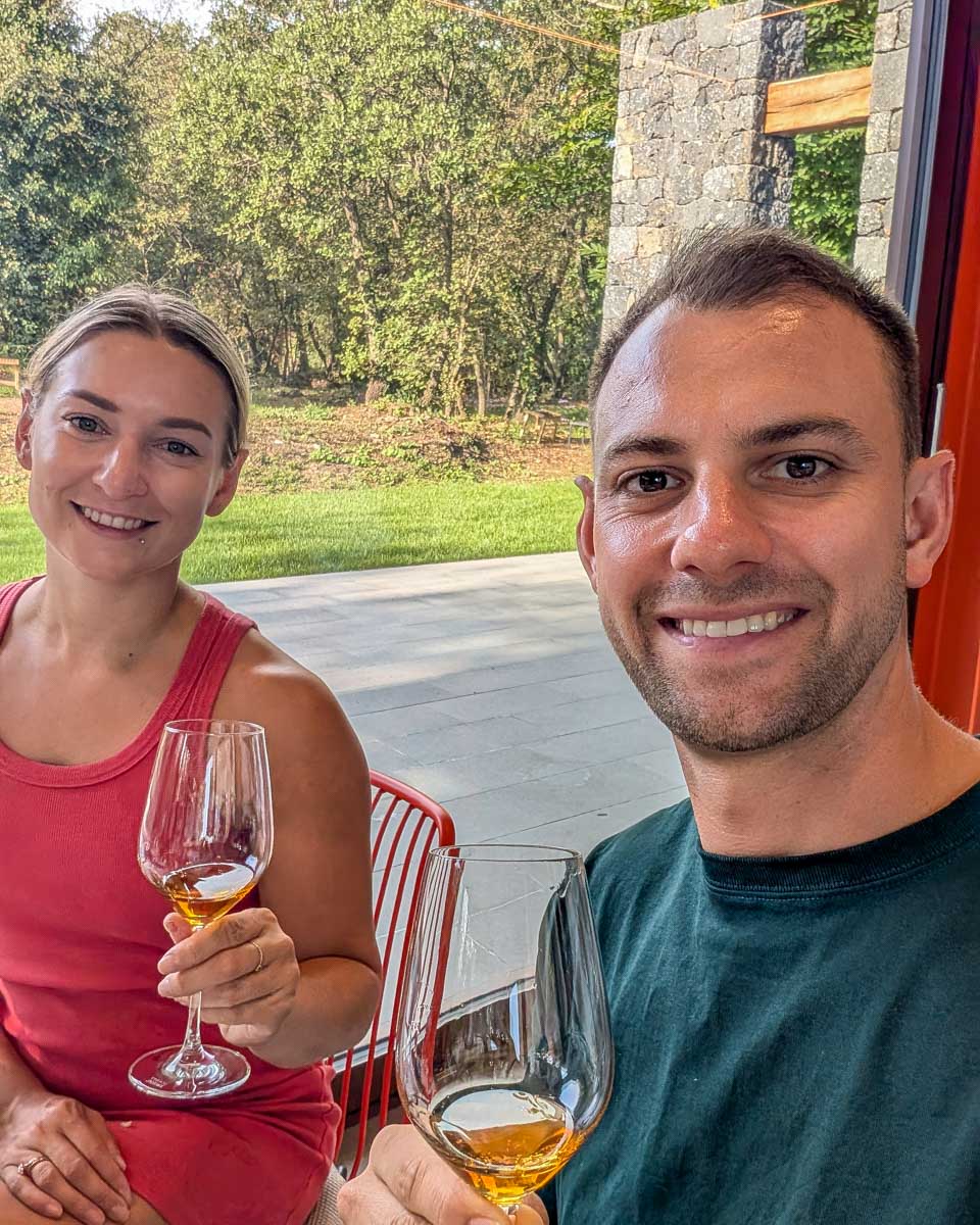 Bailey-and-Daniel-drink-wine-on-a-tour in Mendoza Argentina