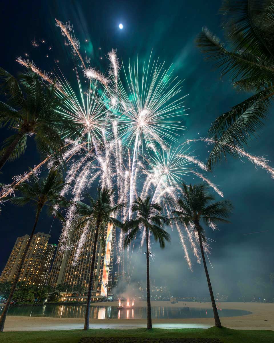 Fireworks seen at night on Waikiki Beach in Waikiki Honolulu Hawaii 1