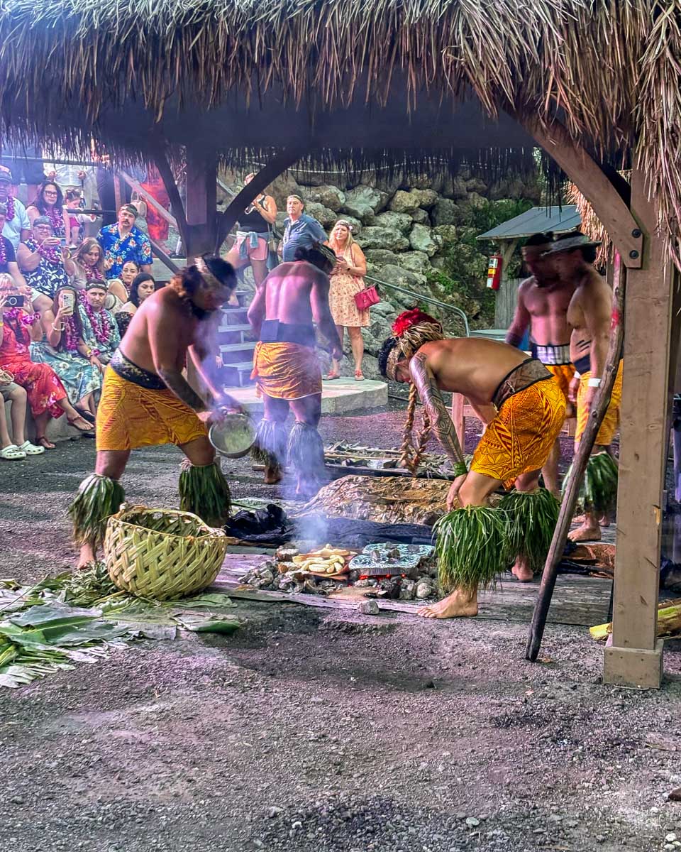 Men-prepare-food-at-a-Luau-in-North Shore Oahu